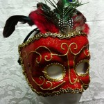 red_with_gold_trim_and_feathers